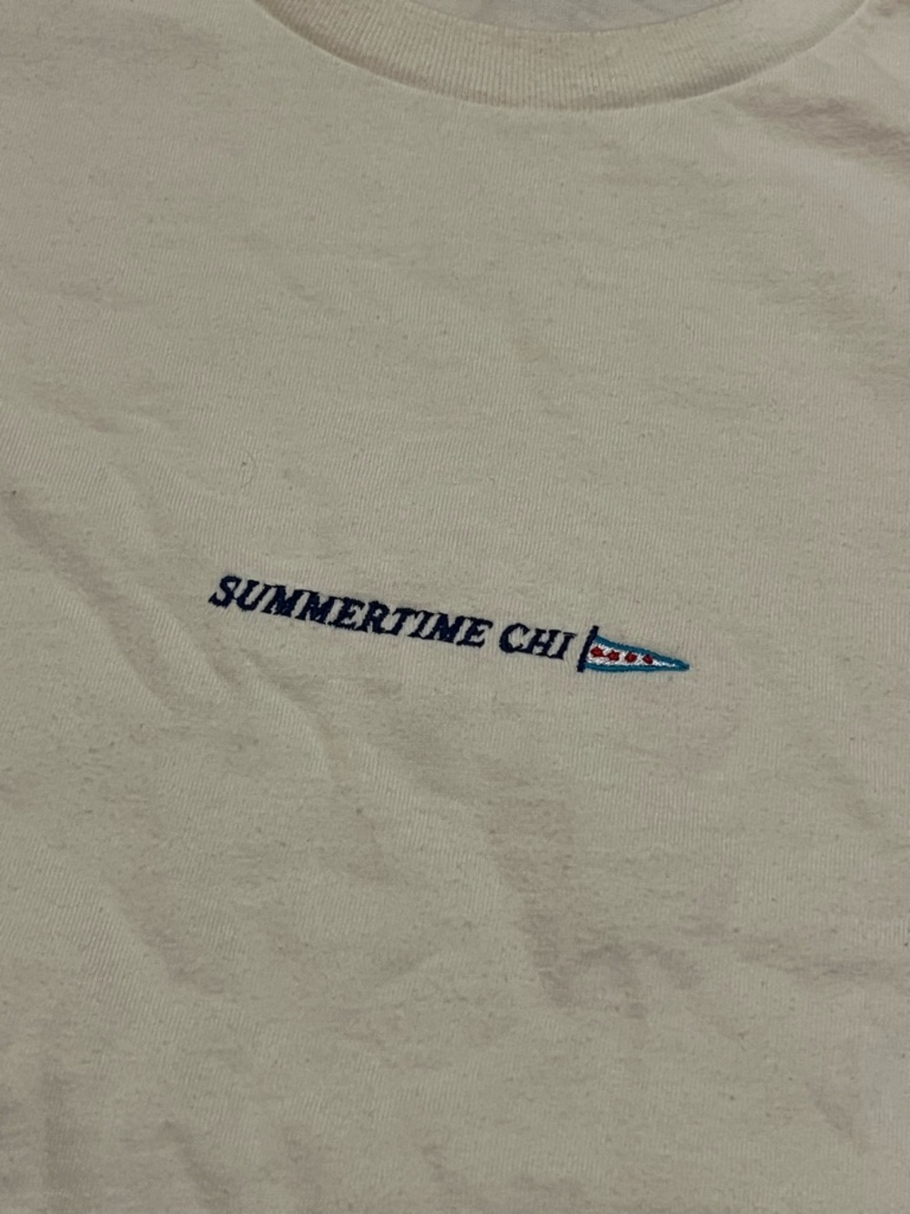 ‘Summertime Chi’ White Short Sleeve Crewneck Tee with Small Navy Logo